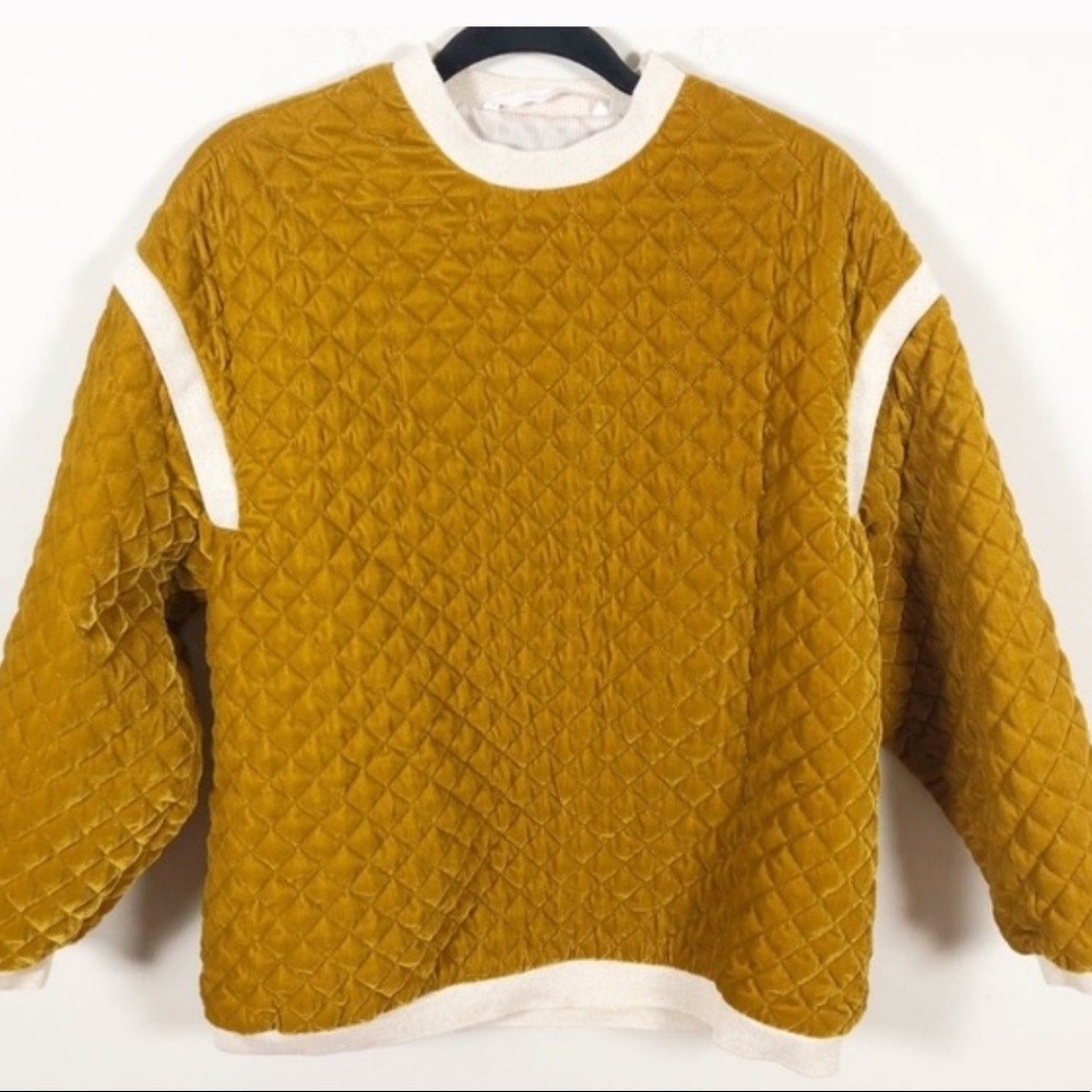 Gold quilted Zara pullover.